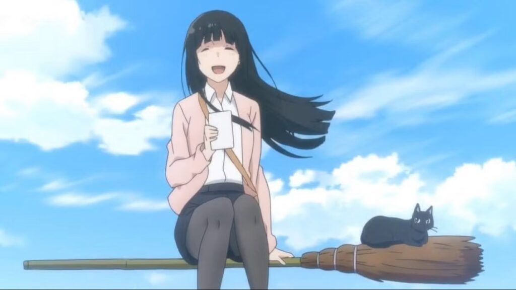 A still from Flying Witch. The main character sits on a broom, grinning, while her black cat perches on the broom's bristles.